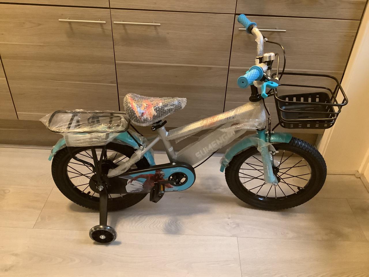 Nieuwe 16 inch jongensfiets met handrem en zijwieltjes