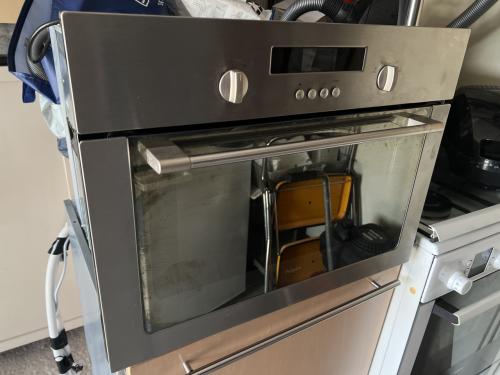 Inbouw Magnetron 60 cm. Breed als nieuw met gebruiksaanwijzing