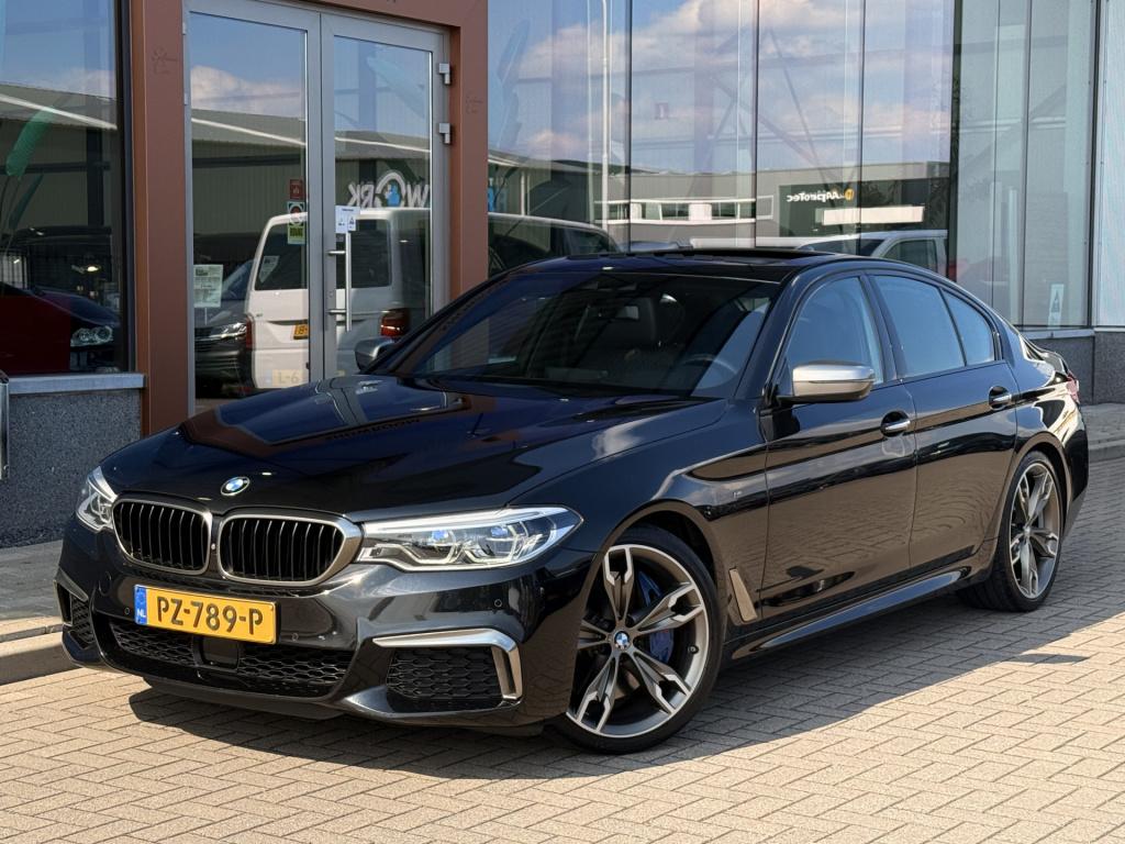 BMW 5 Serie m550i xdrive high executive | 4ws | soft-close | pano | b&w | m