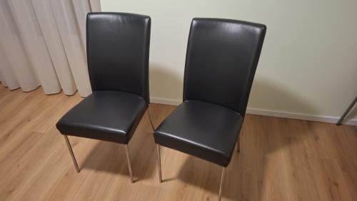 Zwart leer eetkamer stoelen