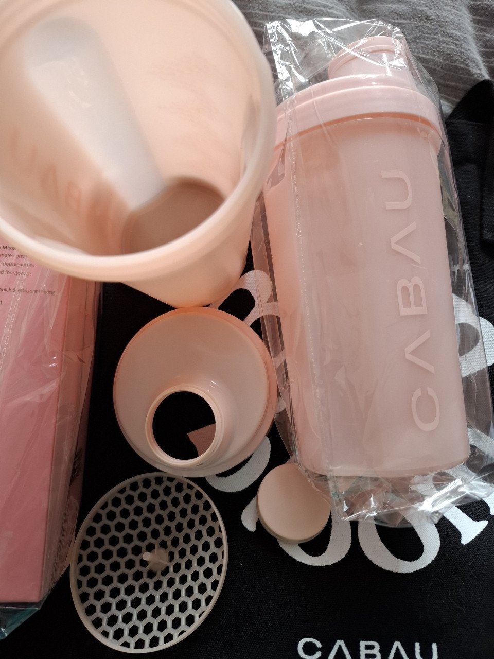 Cabau: mixer, sokken, shaker, notebook, poedertoren, tas XL
