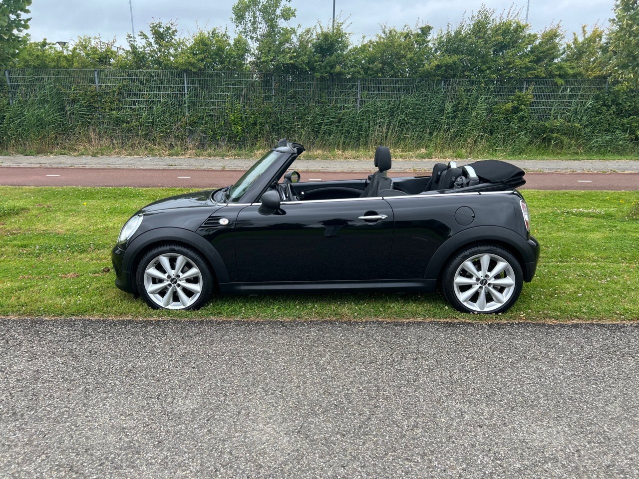 Prachtige Mini One Cabriolet uit 2012 met slechts 114.000 km