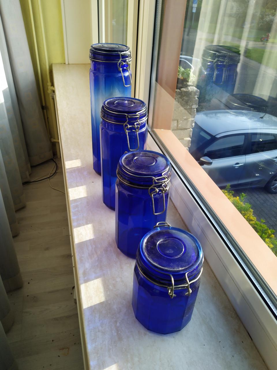 Set blauwe glazen voorraad/sierpotten