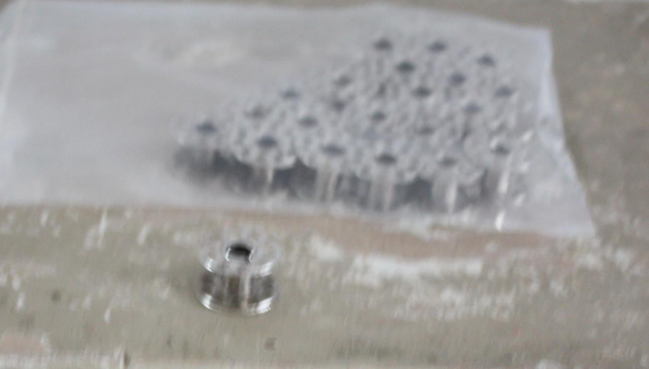 Set van 21 universele spoeltjes