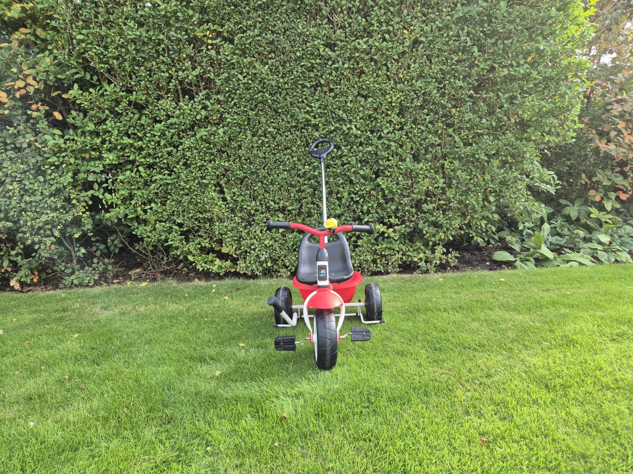 Driewieler Kettler met duwstang.