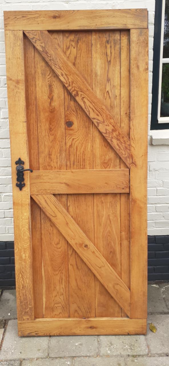 Hardhouten deur