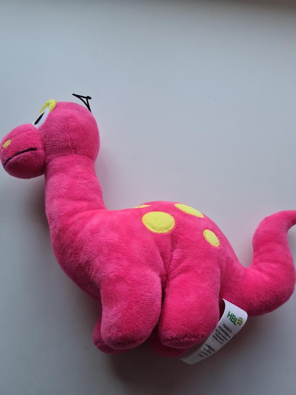 Nieuwe fuchsia roze Dino knuffel Twee stuks voor €2,95