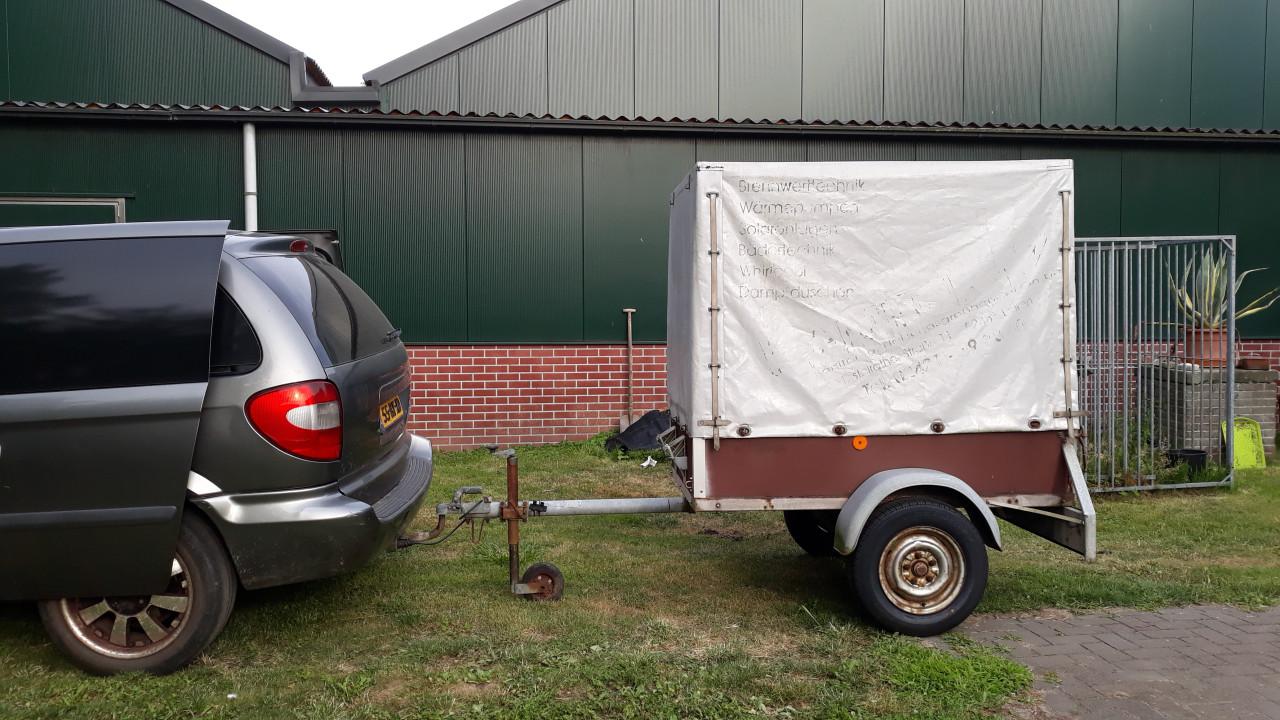 Aanhanger met huif.