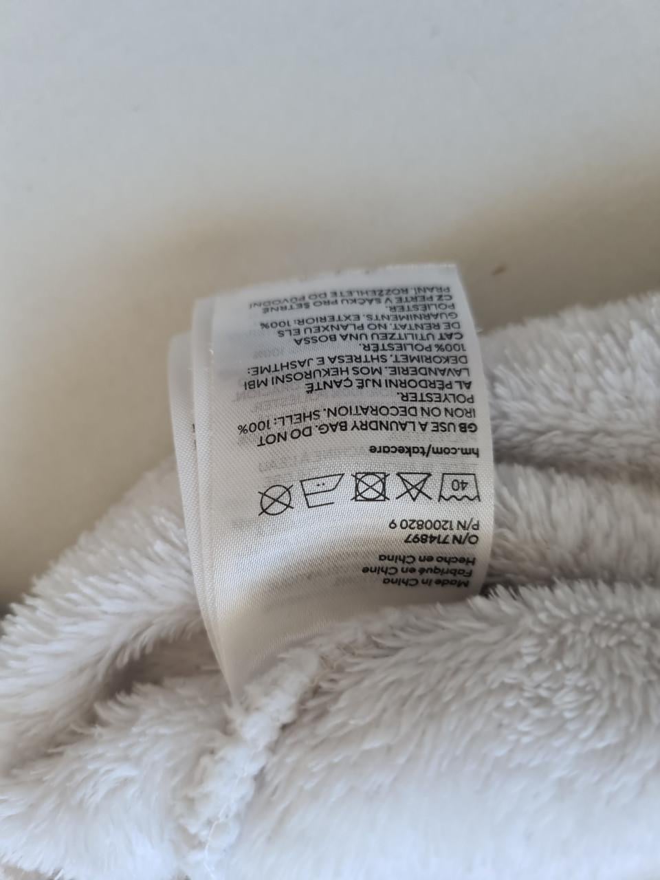 Ecru zachte sweater met pailletten unicorn van H&M  Maat 134-140