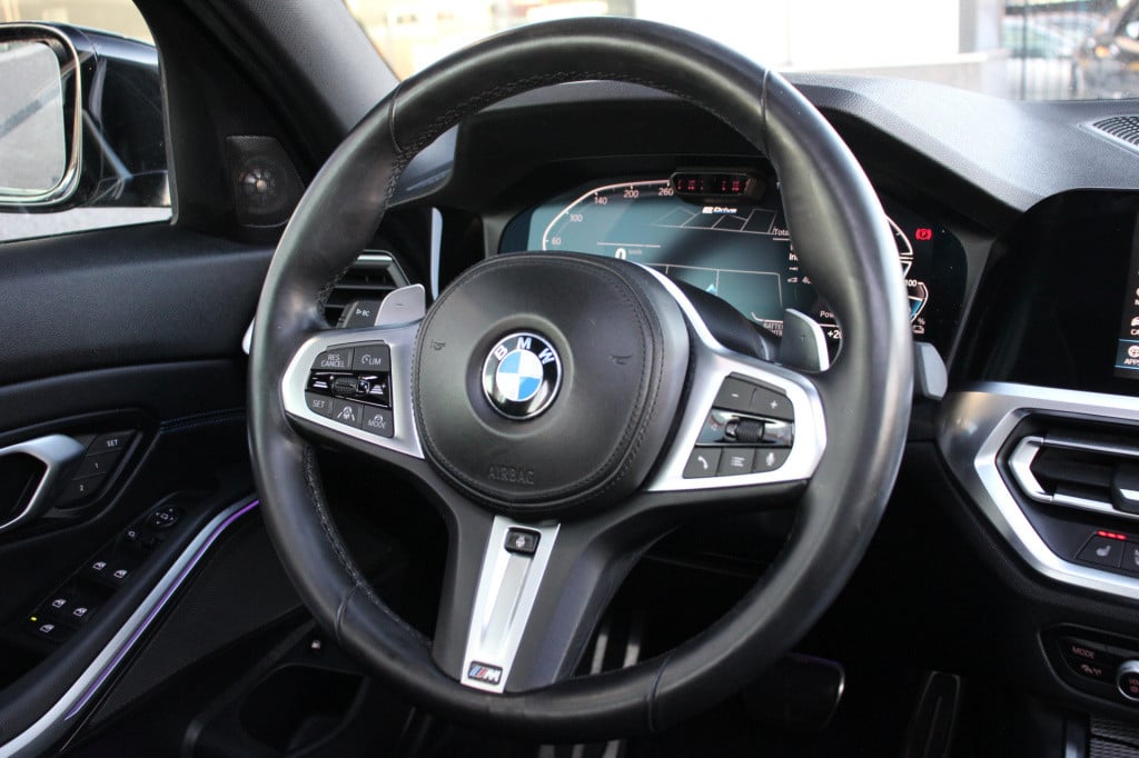 BMW 3-serie 330e high executive m-sport | schuifdak | laser | h&k | el. sto