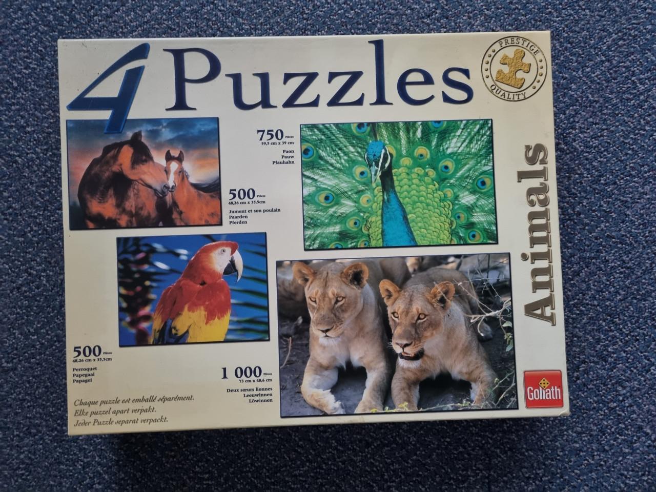 4 puzzels in een doos