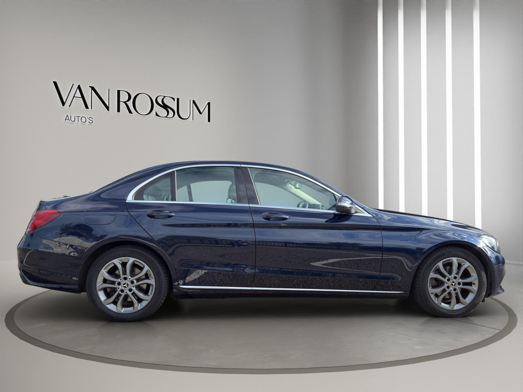 Mercedes-Benz C-Klasse c 180 business solution auto | navigatie | half lede