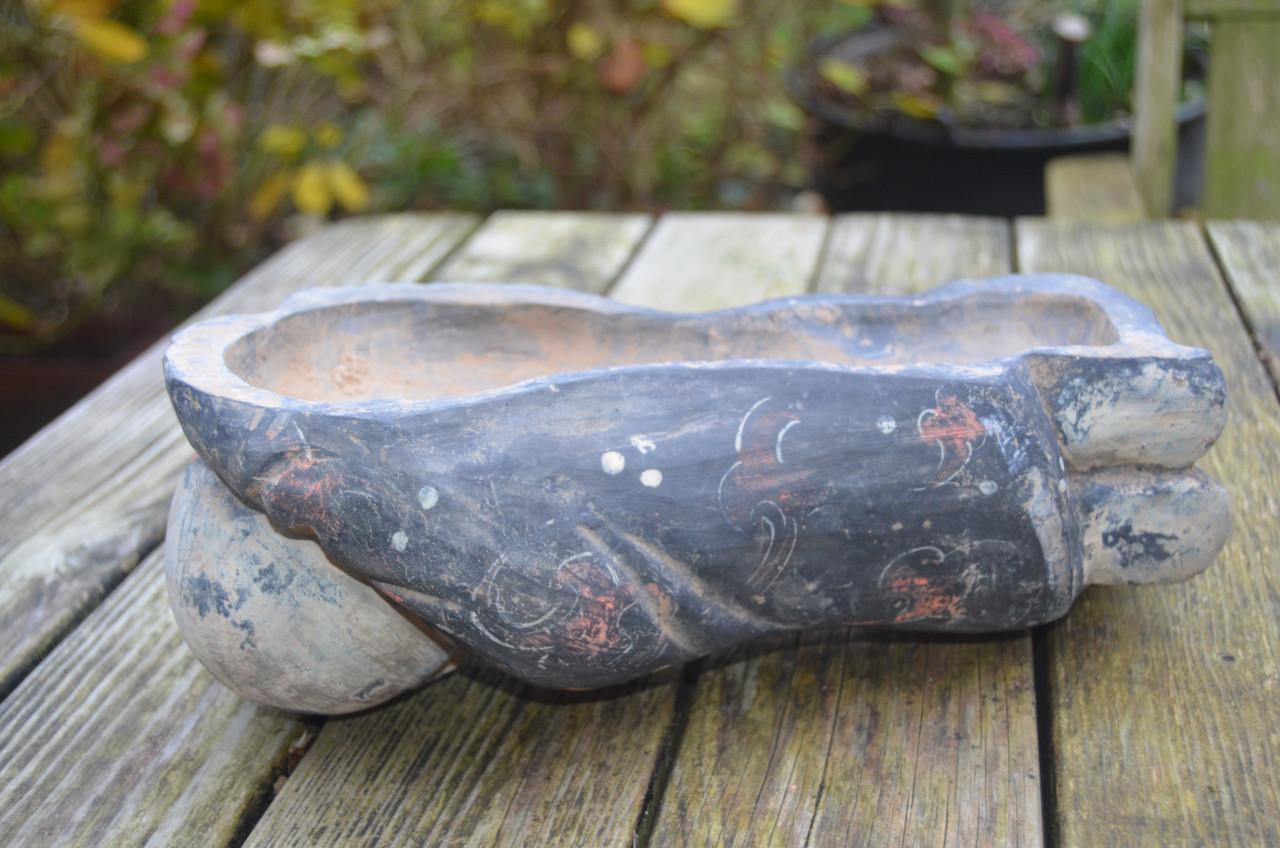 Chinees beeld van een slapend zotje ipst.