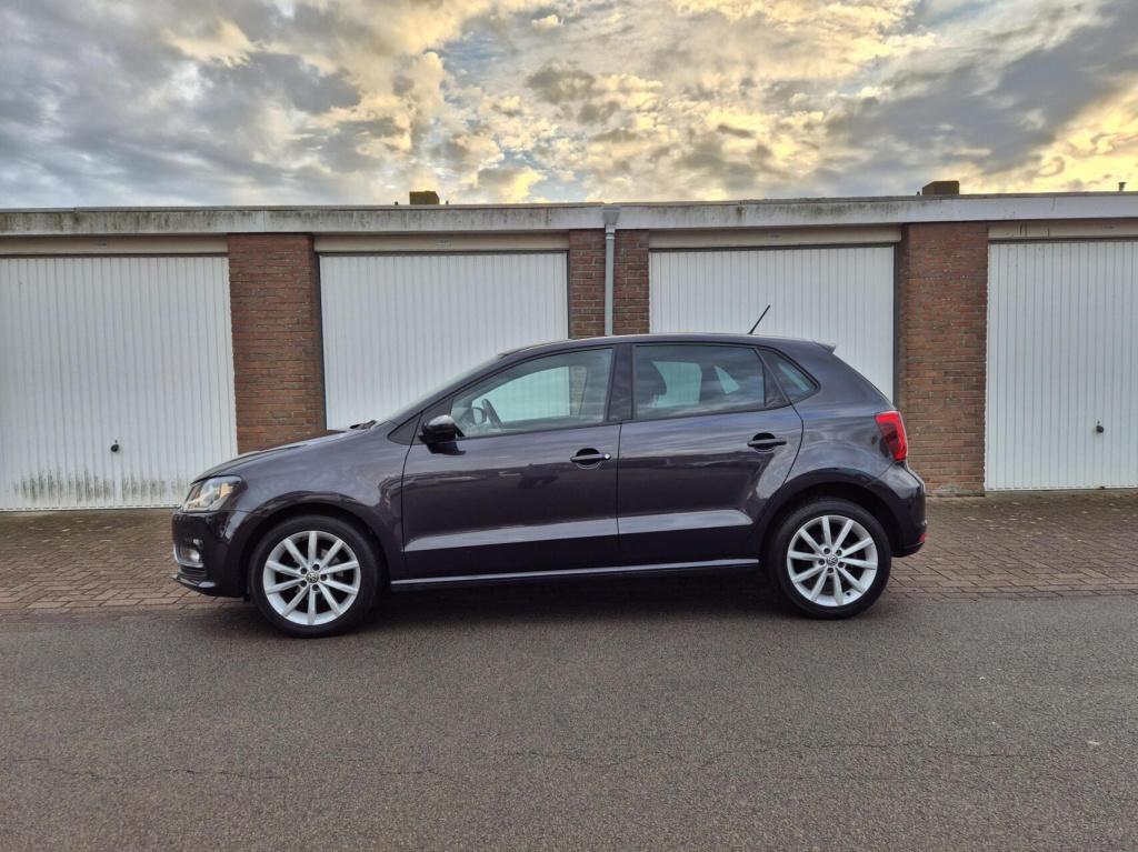 Volkswagen Polo 1.2 tsi lounge / 5- deurs / cruisecontrol / stoelverwarming