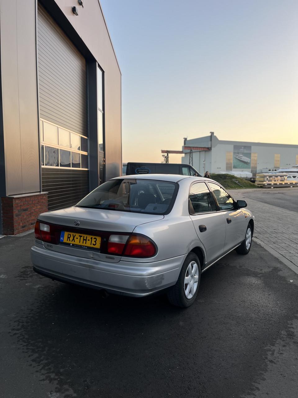 Mazda 323 1.5 SDN LX 1997 Grijs