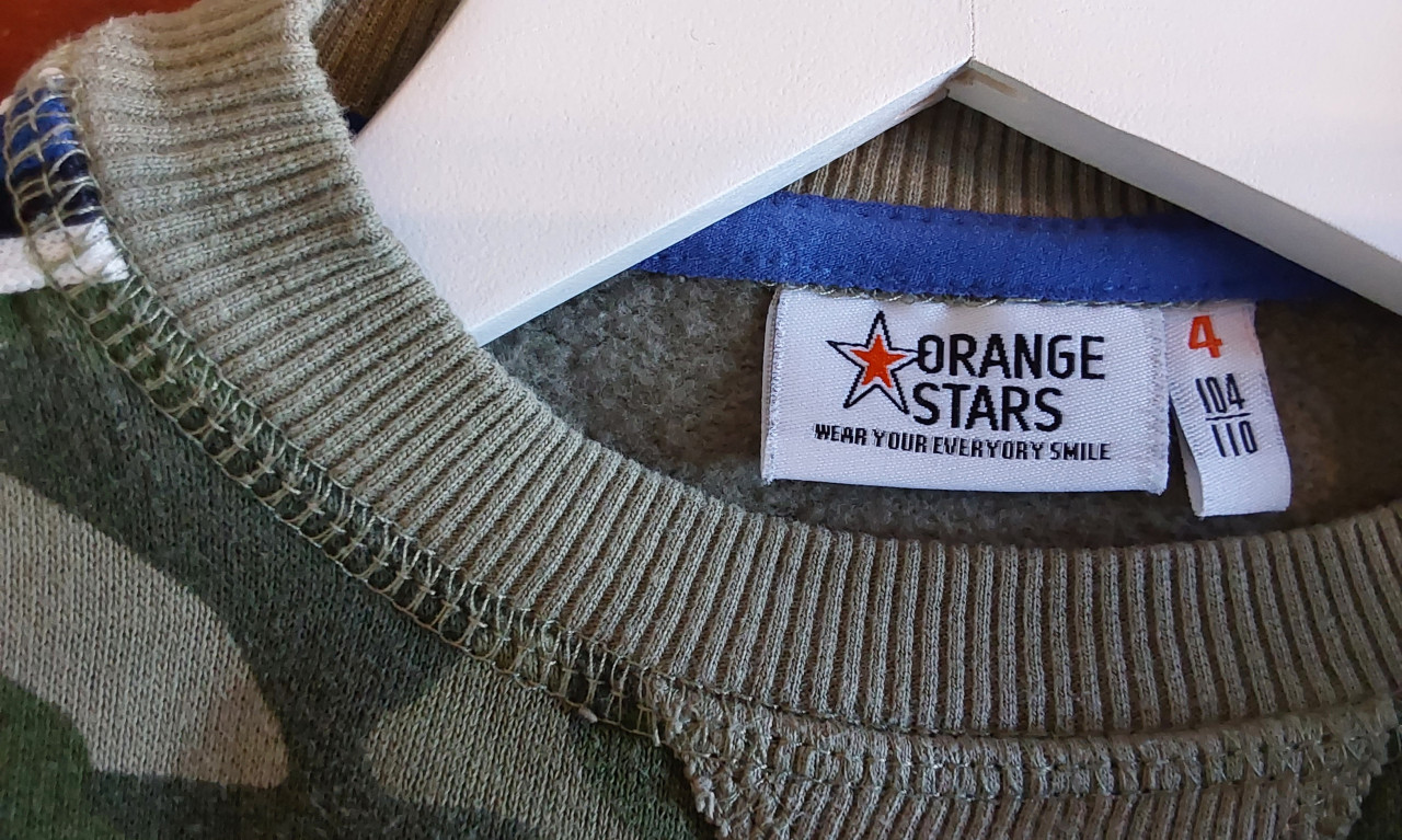 Orange Stars trui maat 104/110