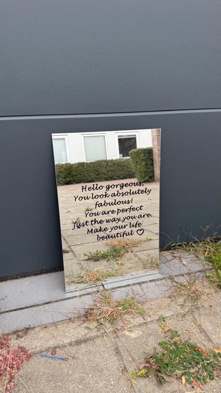 Spiegel met tekst