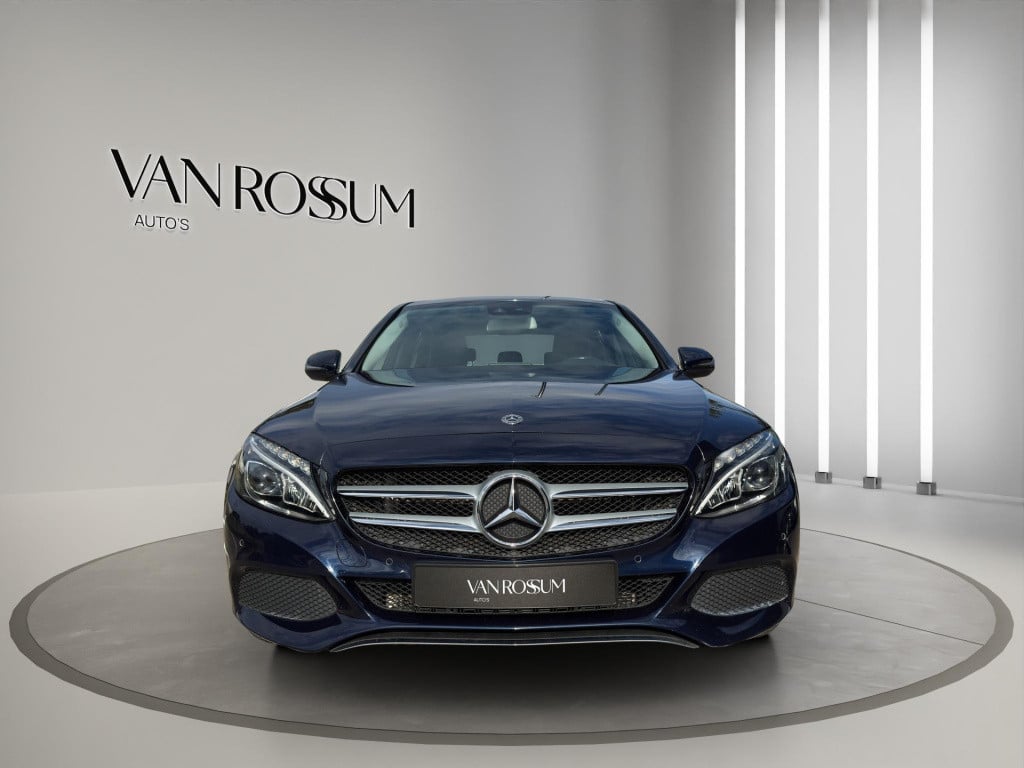 Mercedes-Benz C-Klasse c 180 business solution auto | navigatie | half lede