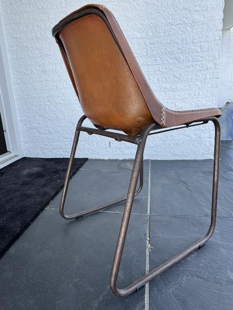 8 stuks lederen eetkamerstoelen