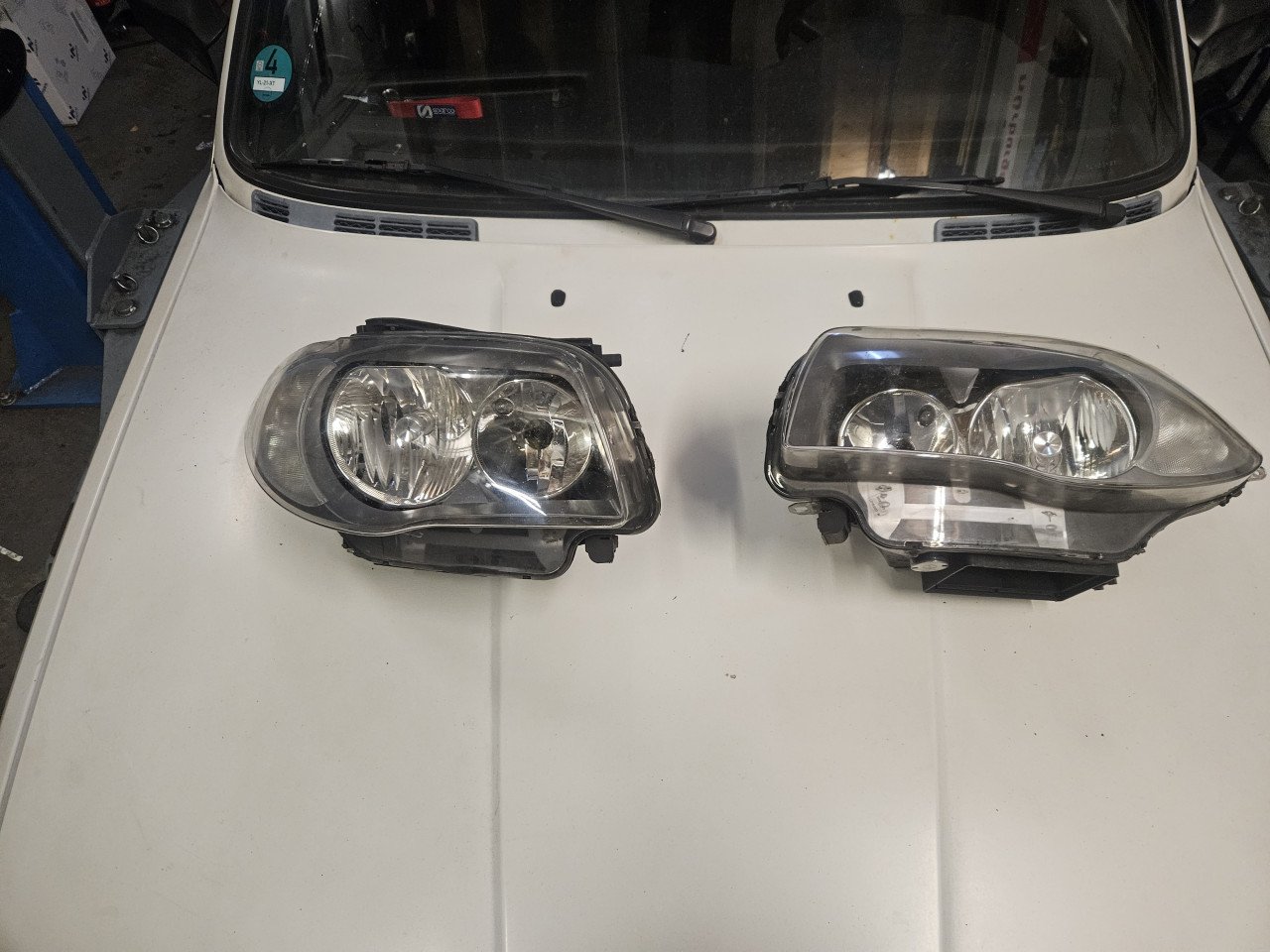 Bmw 1serie koplampen origineel