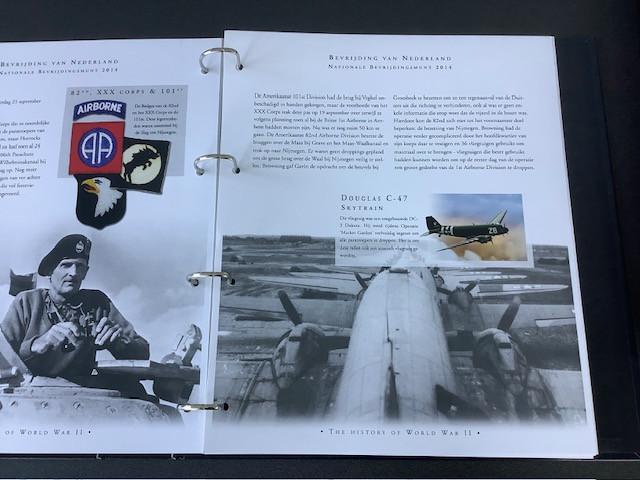 Cassette met 9 penningen “De Nationale Bevrijdingsmunten”.