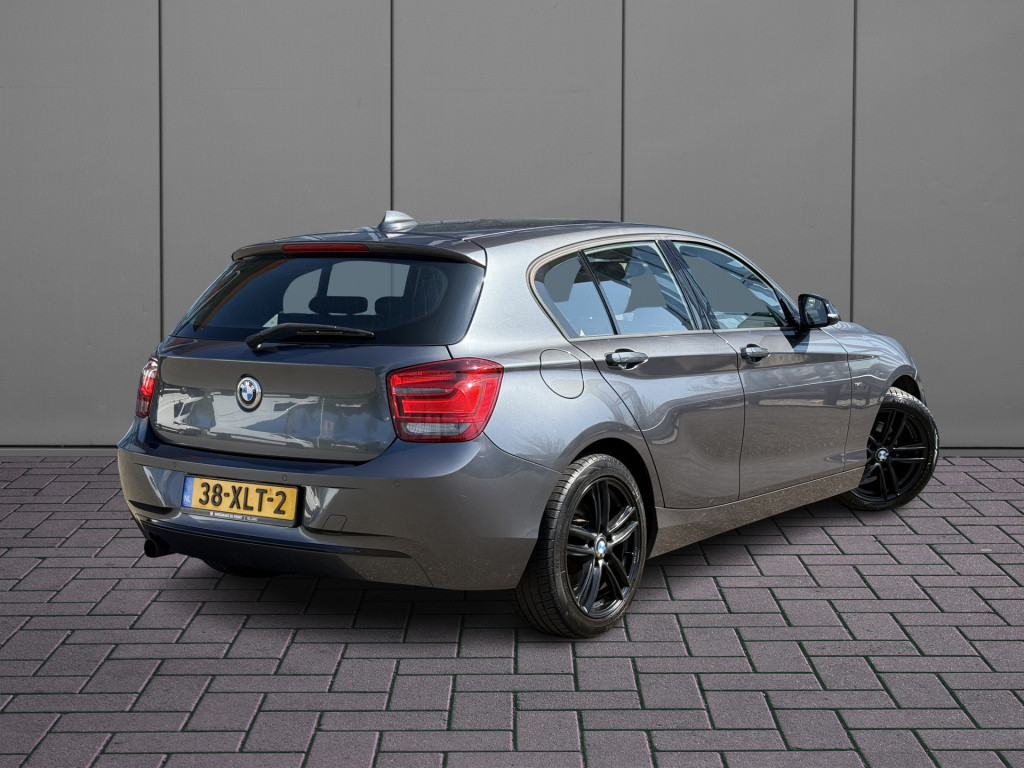 BMW 1 Serie 116i business sportline | nl-auto | groot navi | nieuwe distrib