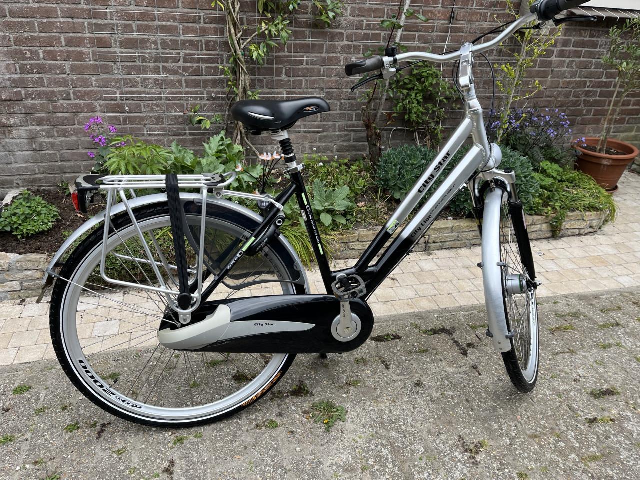 Dames fiets City Star 8 versn trom-rem verlichting Uit de Gazelle familie..