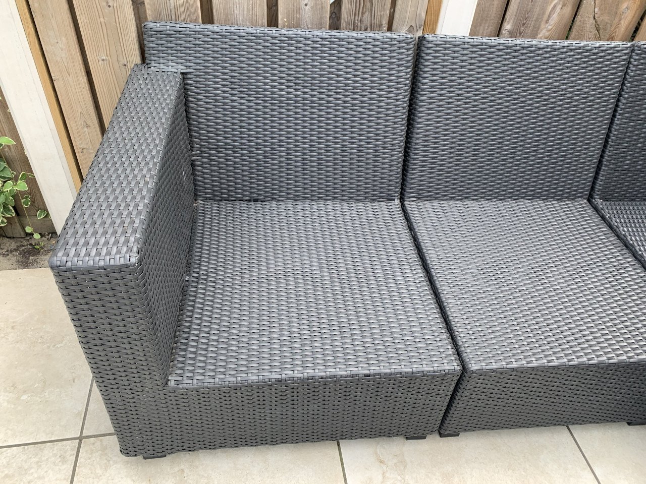 Loungeset zwart wicker, plus tafel plus kussens