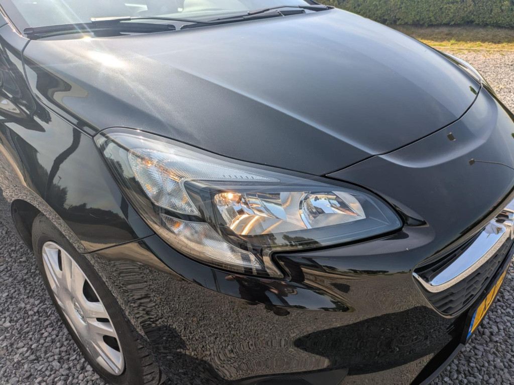 Opel Corsa 1.4 favourite | airco | cruise control | bluetooth