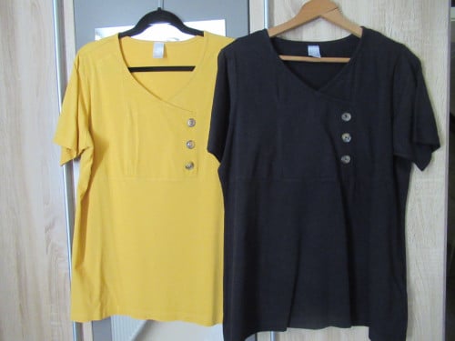 2 T-shirts, geel en zwart, zo goed als nieuw.