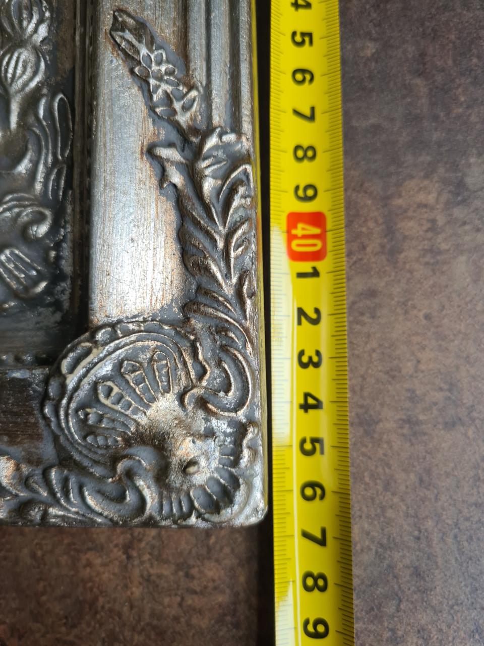 Prachtige Brocante spiegel met een sierlijke zilveren lijst