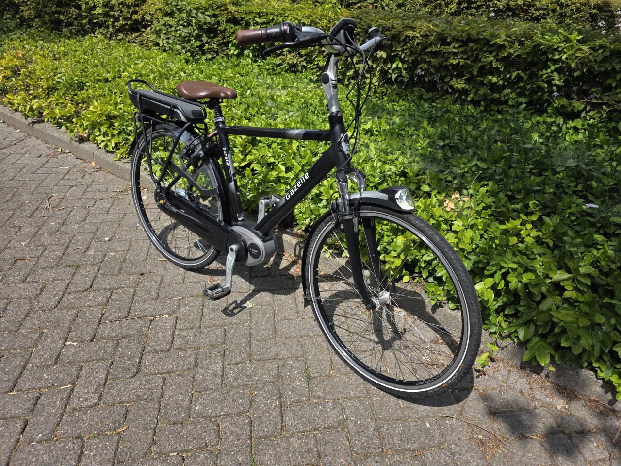 Keurig nette Gazelle elektrische heren fiets met Bosch middenmotor