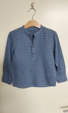 Lichtblauwe gestreepte blouse van het merk C&A in maat 104