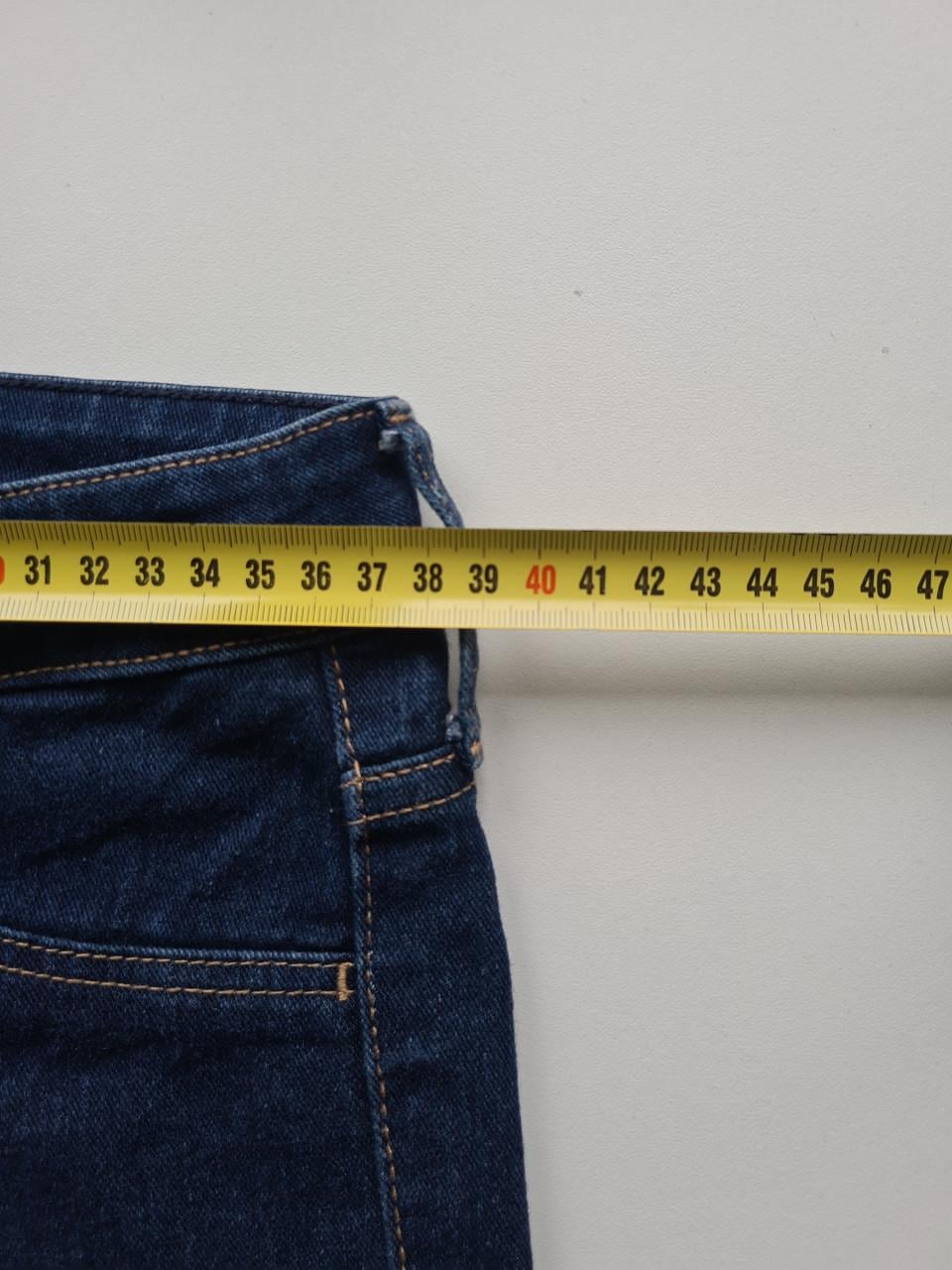 Donker blauwe skinny stretch spijkerbroek van H&M  Maat M