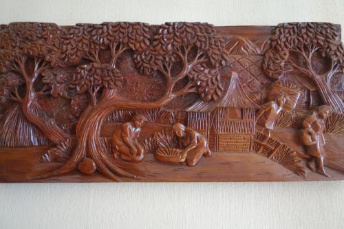 Vintage Indonesisch /Bali handgesneden houten paneel 69 x 32' cm