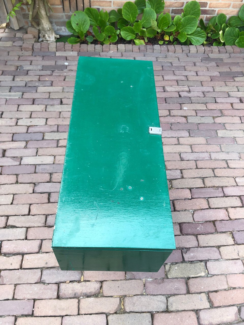 Groene houten kist.