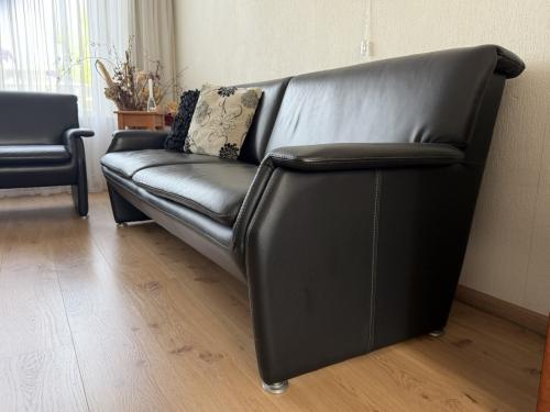 Zwart leren bankstel