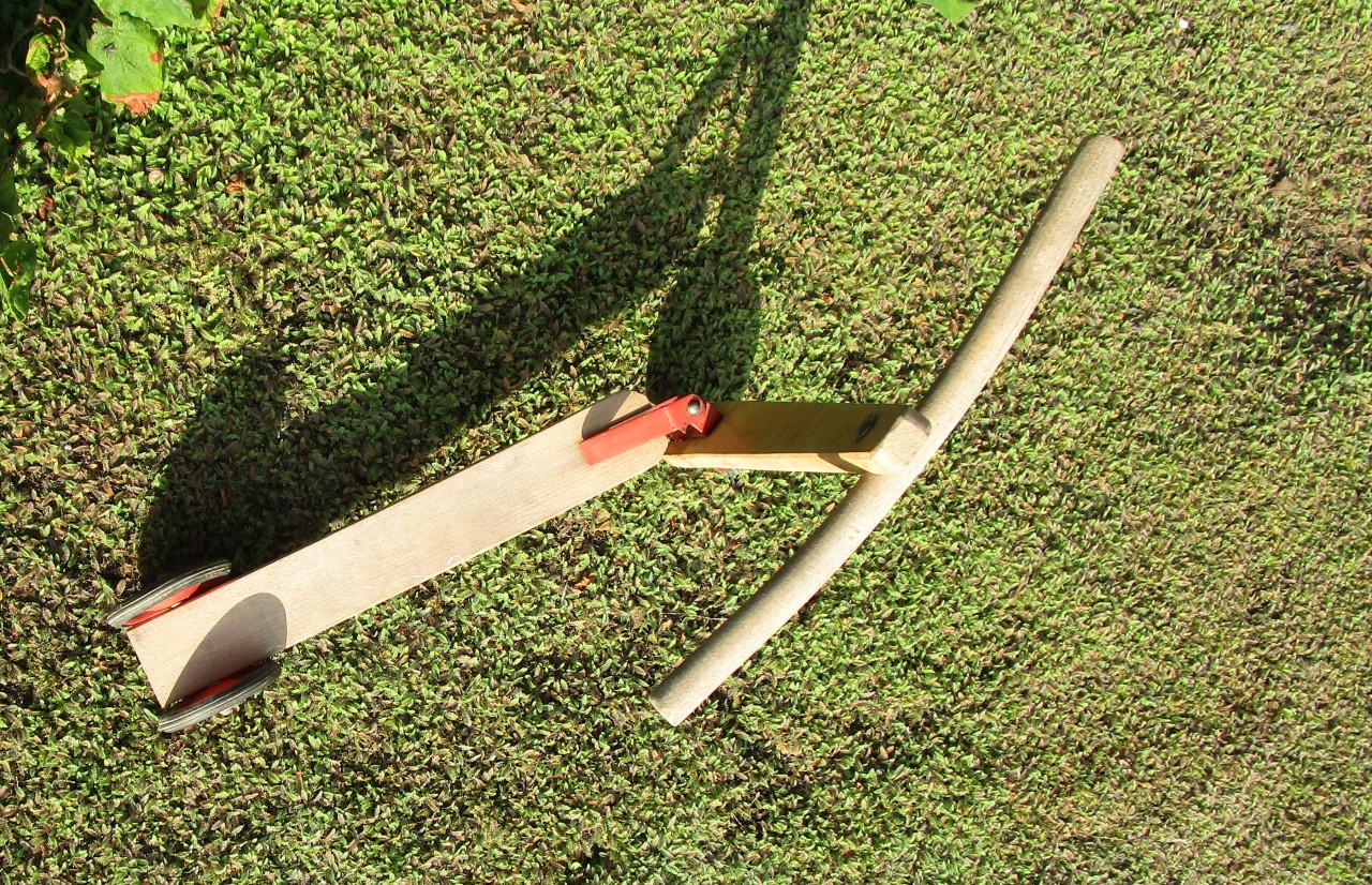 Houten 3 wiel stepje.