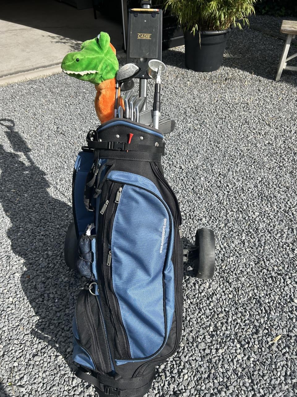 Trolley met complet set golfclubs van Dunlop pro