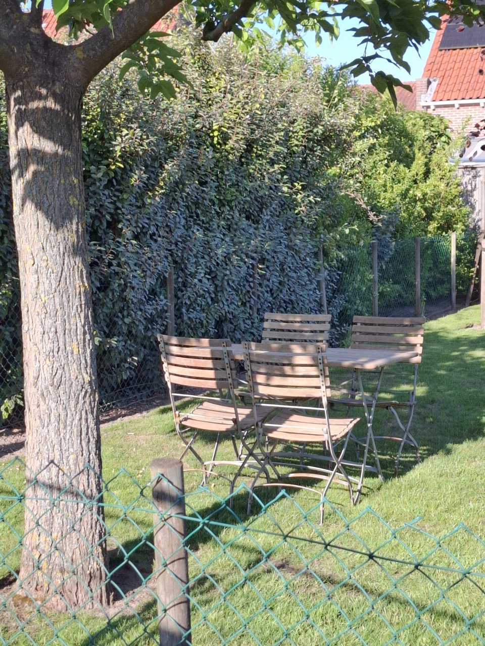 Oud teakhouten tafel + 4 stoelen