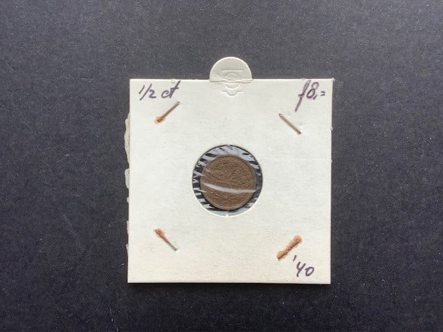 Wilhelmina lotje 1/2 cent 7 stuks.
