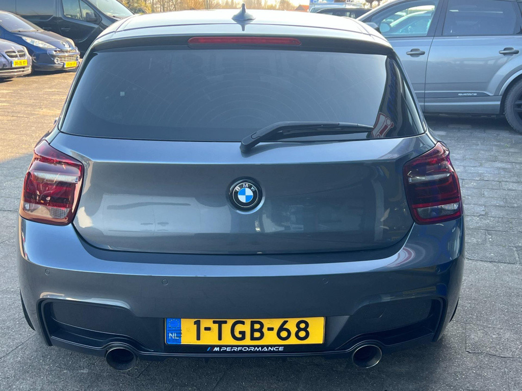 BMW 1 Serie m135i xdrive high executive, customized, stage 2 437 pk!
