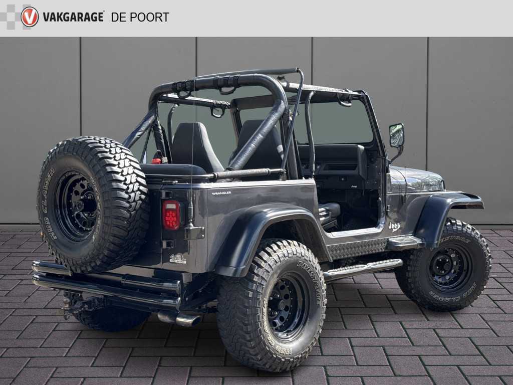 Jeep Wrangler 4.0i sport | gerestaureerd | bullbar | sidebars | trekhaak