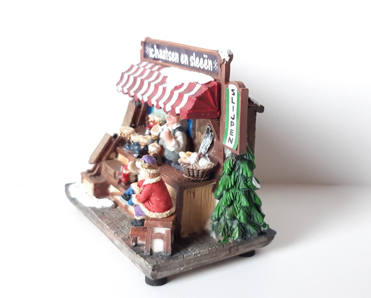 Hollands kraam: schaatsen en sleeën, kerstdecoratie met verlichting
