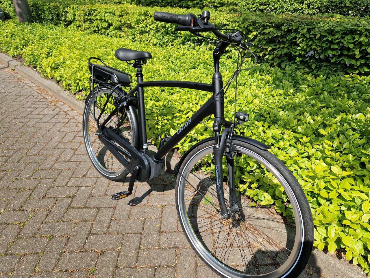 Keurig nette Union elektrische heren fiets met Bosch middenmotor
