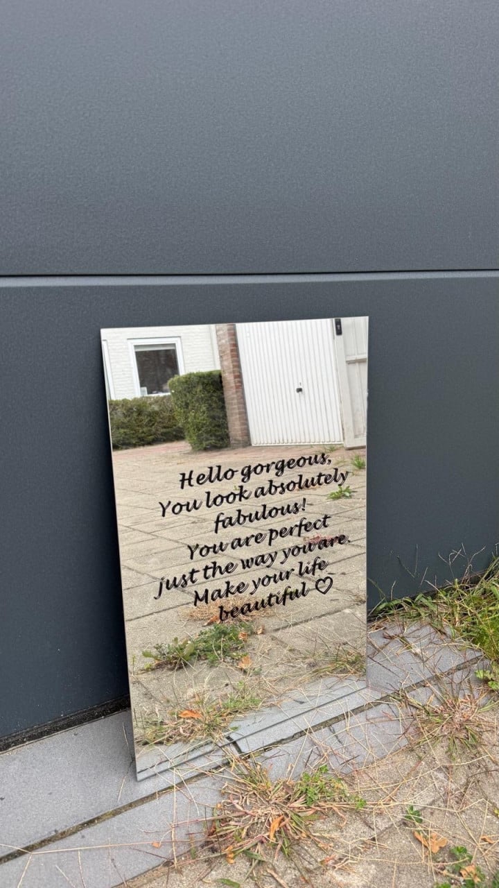 Spiegel met tekst