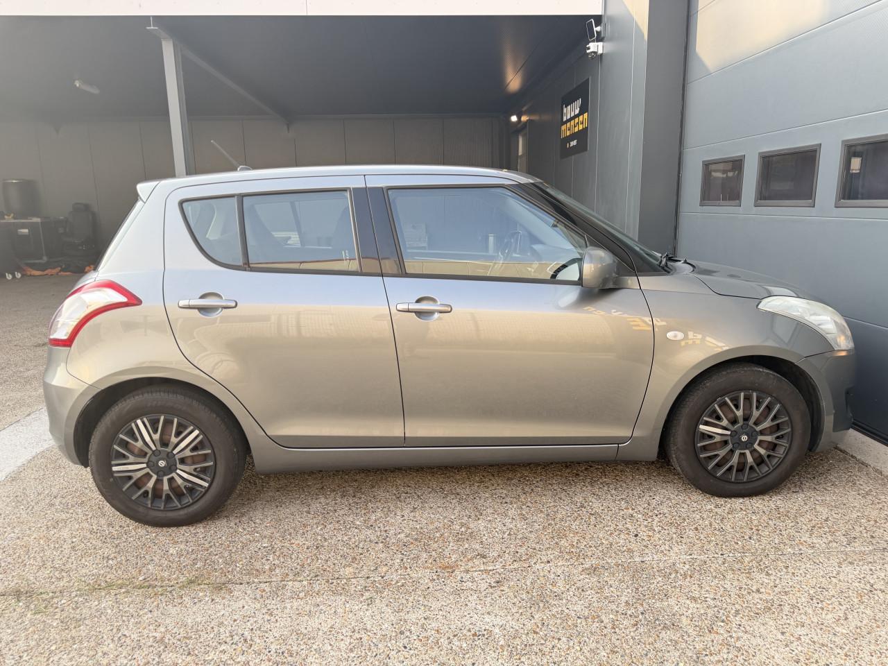 Suzuki Swift 1.2 Comfort EASSS 2011 5Drs Grijs Airco Apk Nap Navi