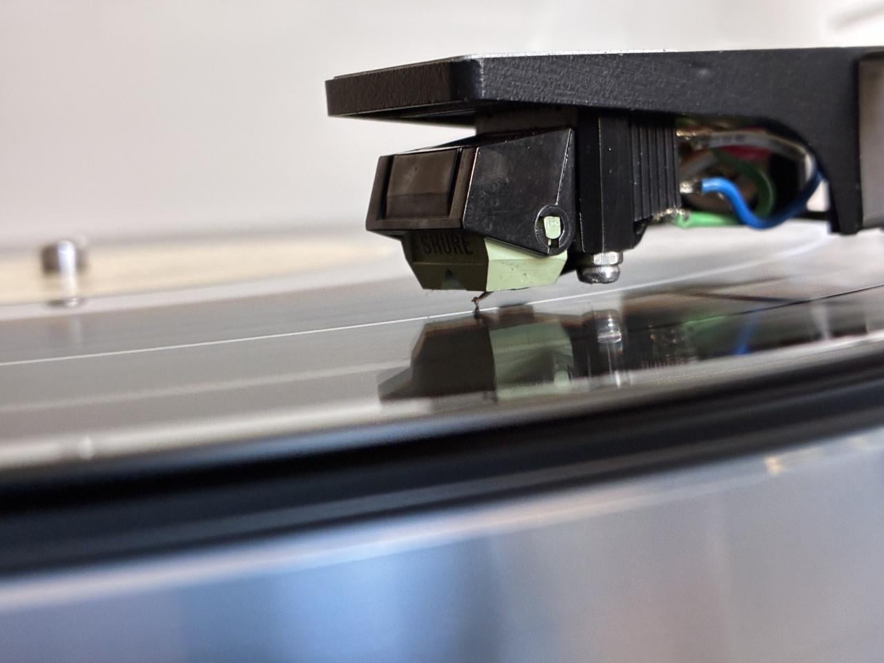 Thorens TD 166 met Shure 95 element.