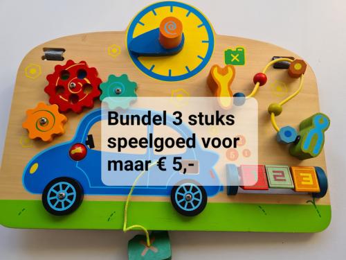 Primi Passi houten activiteitenbord in garage-thema.