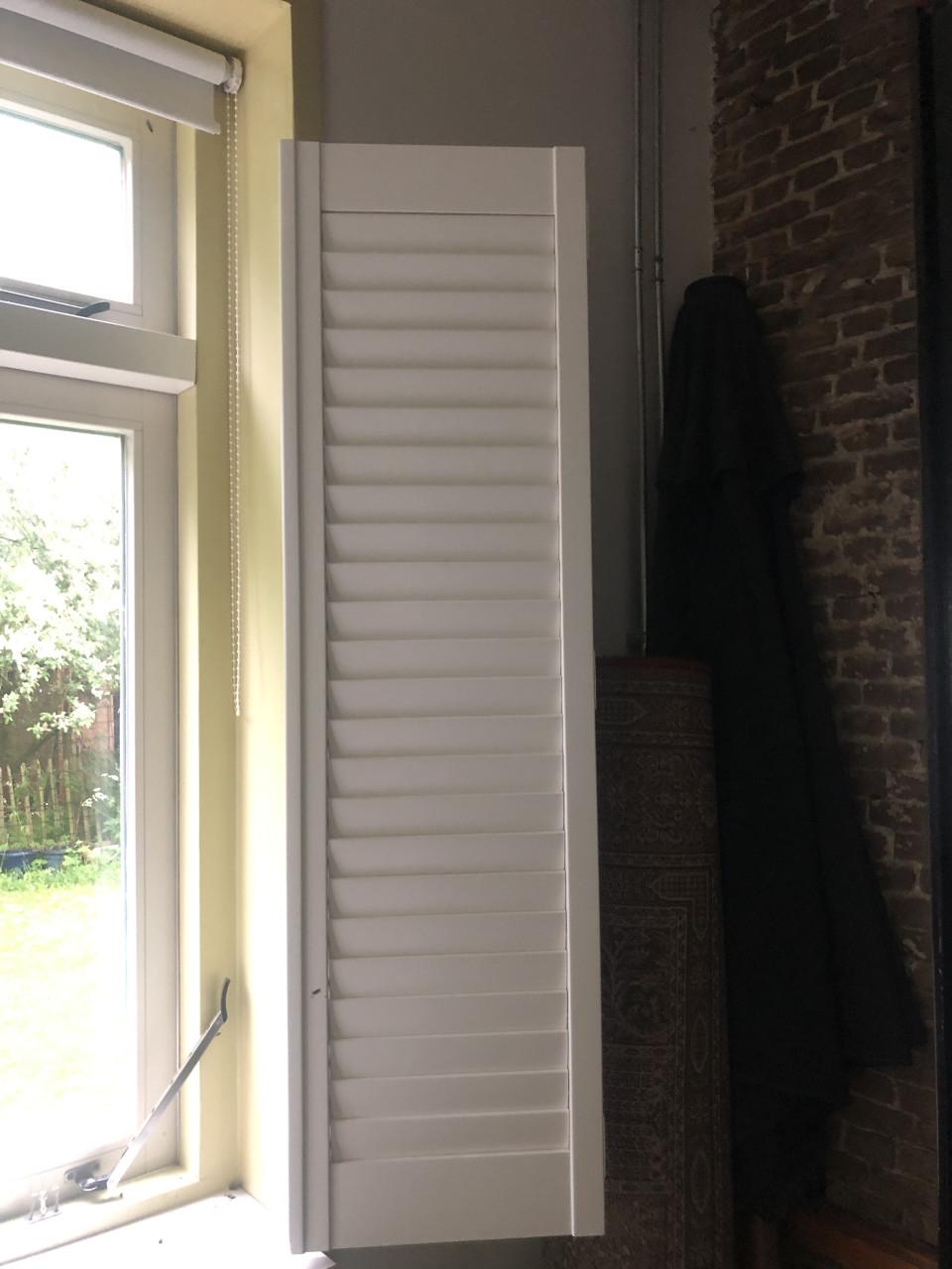 Gratis: 1 paar witte shutters
